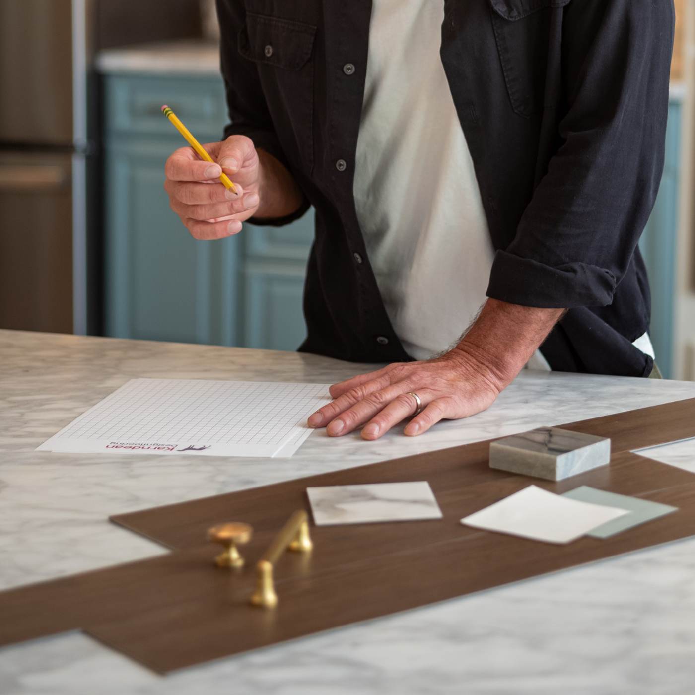 Ty Pennington drawing out a floor plan