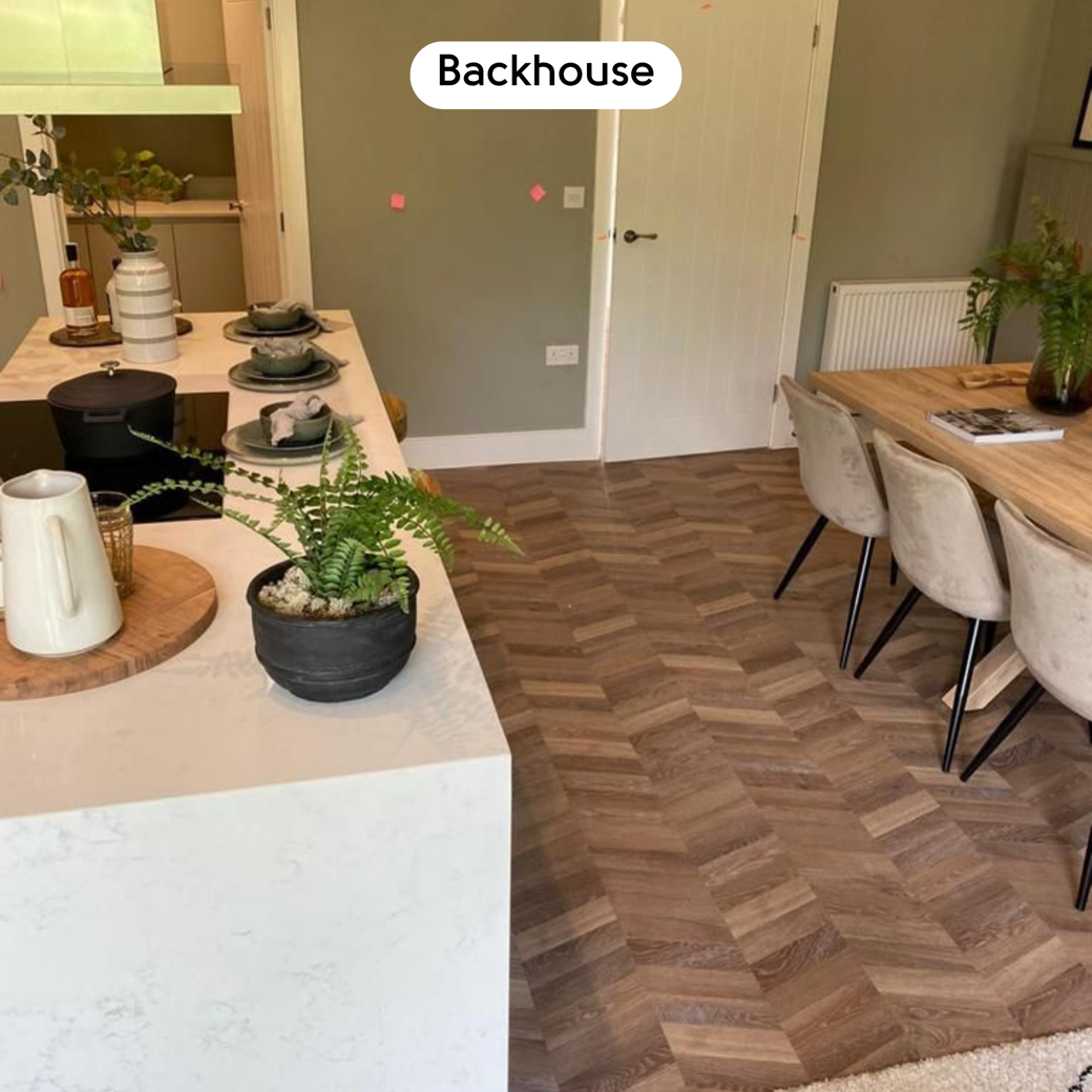 Kitchen and dining area with Pale Limed Oak CH-KP94 chevron floors by Backhouse